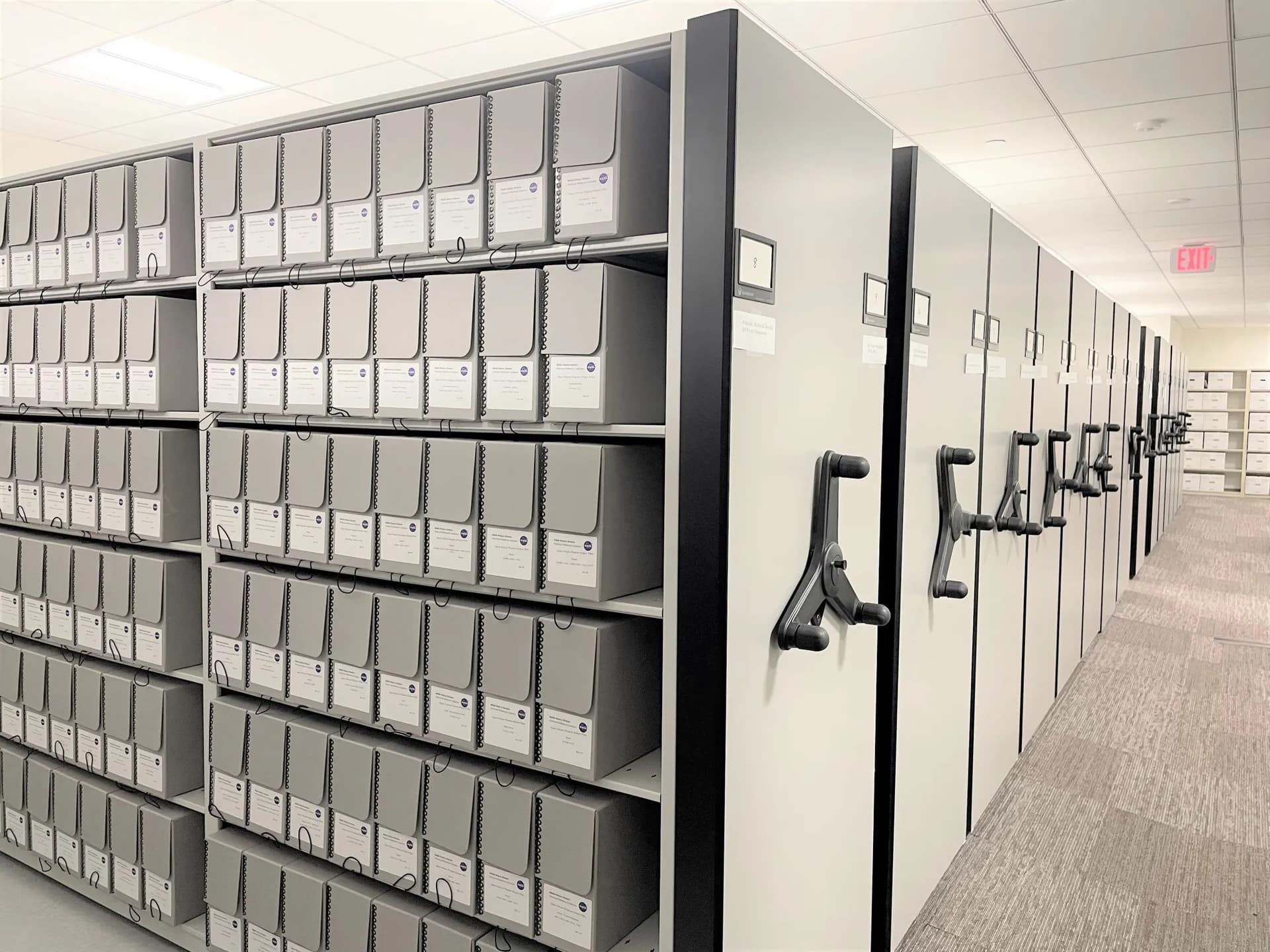Government archives high-density mobile shelving with archive boxes